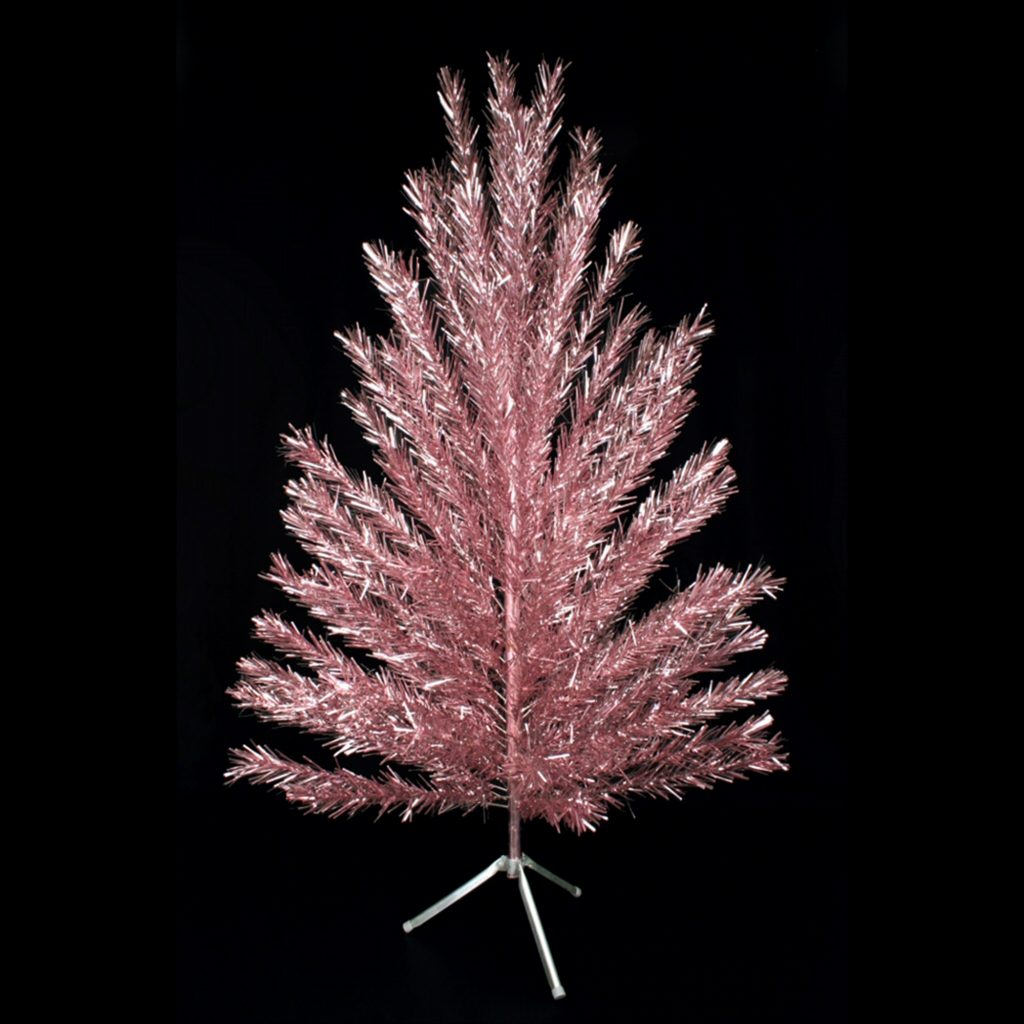 Evergleam aluminum Christmas tree, ca. 1965 Six-foot pink tree Typically, Evergleam owners used color projectors to splash light onto the silver branches of their trees, but in the 1960s, Aluminum Specialty began to produce a number of trees with colored branches of green, gold, and pink. Pink Evergleams are highly sought after today, partly because few were originally produced. WHS Museum #2005.174.1A-CR