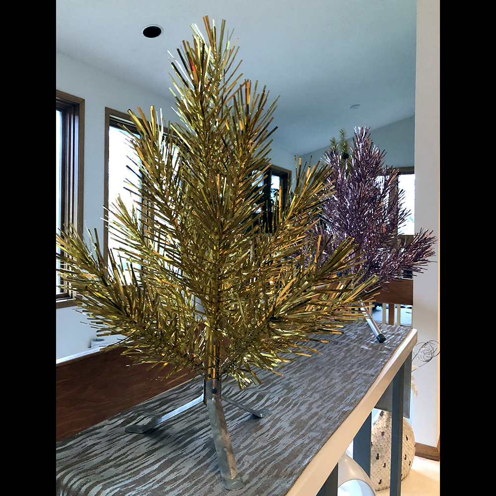 Two-foot Evergleam aluminum Christmas trees, early to mid-1960s. Aluminum Specialty designed trees for tabletop use, which were ideal for small living spaces. Two-foot trees came in silver, gold, pink, and green. (Private collection)