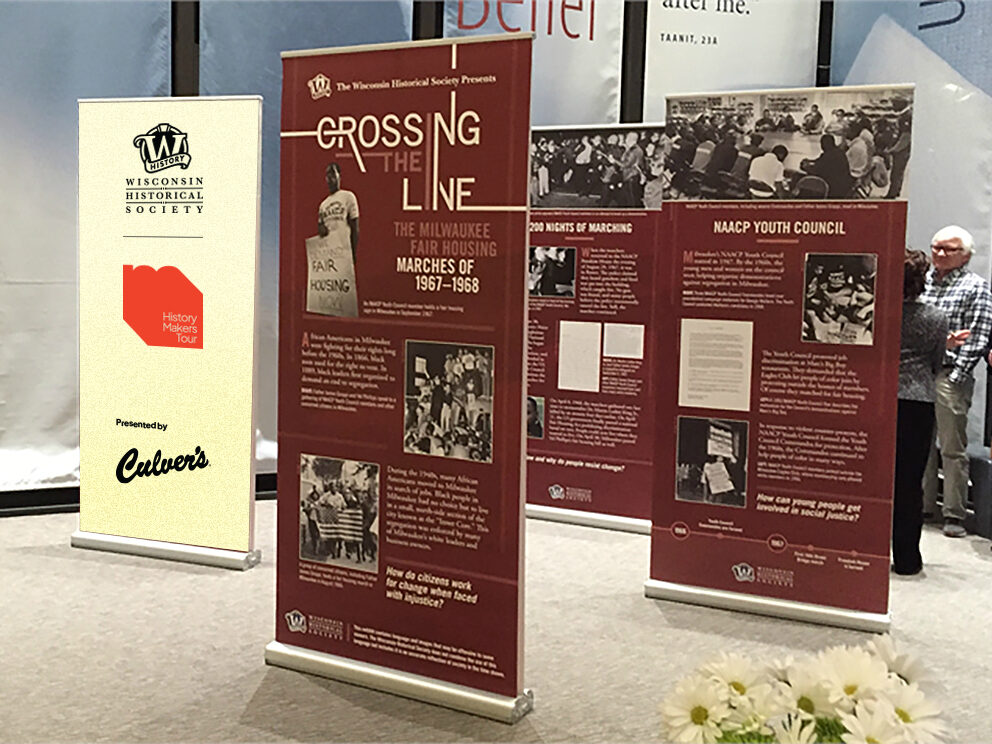 A series of tall displays showcase different information about Women's Suffrage in the US.
